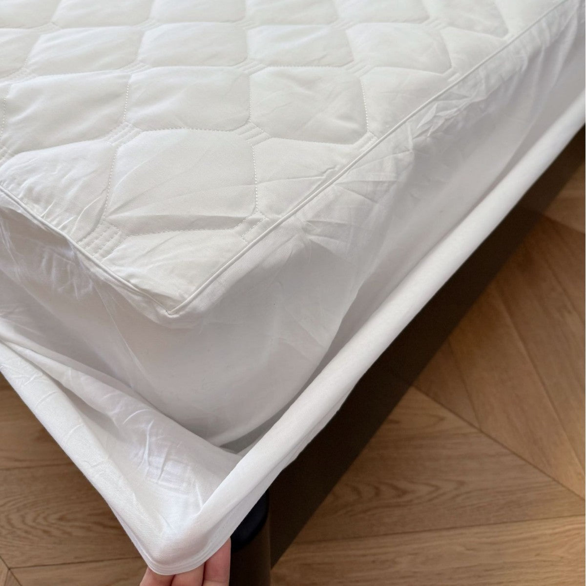 Quilted mattress protector with all-round elastic and non-slip underside — product view 2