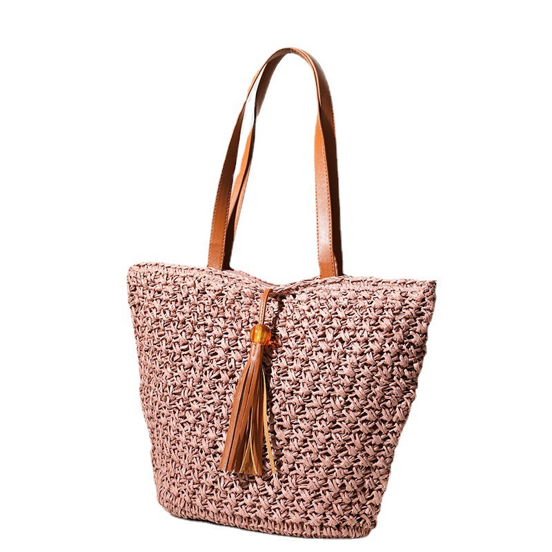 Handcrafted basket bag with fashionable tassel detail LoungeYard — product view 5