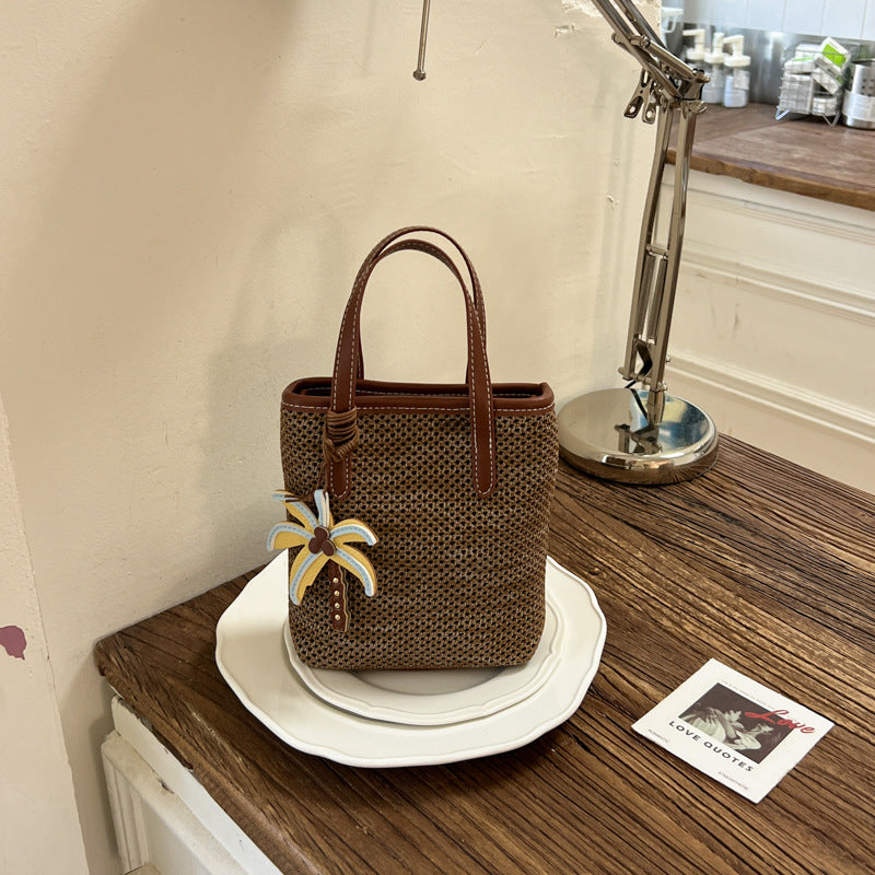 Woven Beach Handbag with Decorative Charm — product view 6