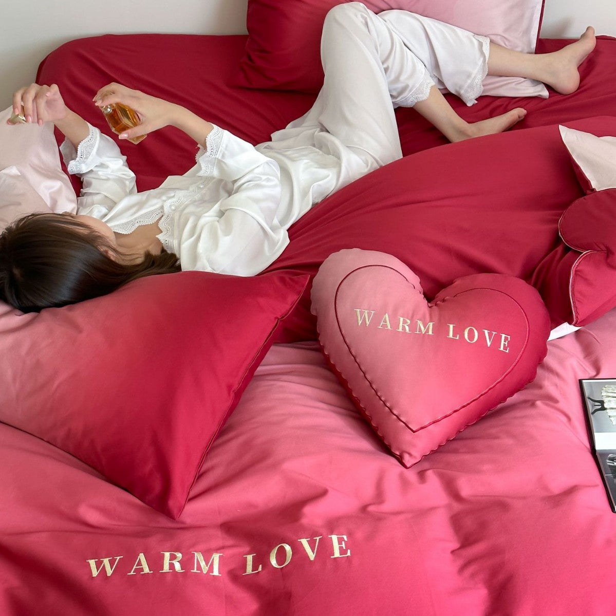 Reversible cotton satin bedding set with heart appliqué and embroidery motif LoungeYard — product view 1