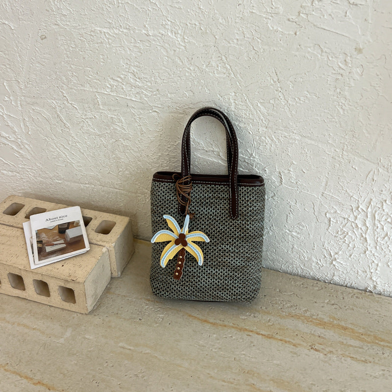 Woven Beach Handbag with Decorative Charm — product view 7
