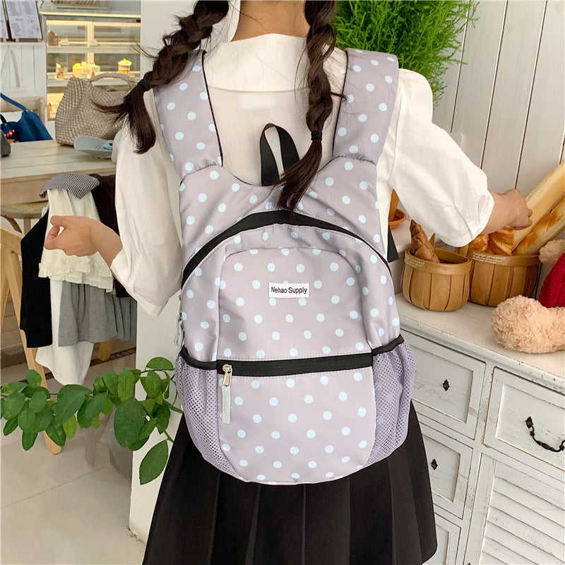 Playful Polka Dot Patterned Backpack LoungeYard — product view 2