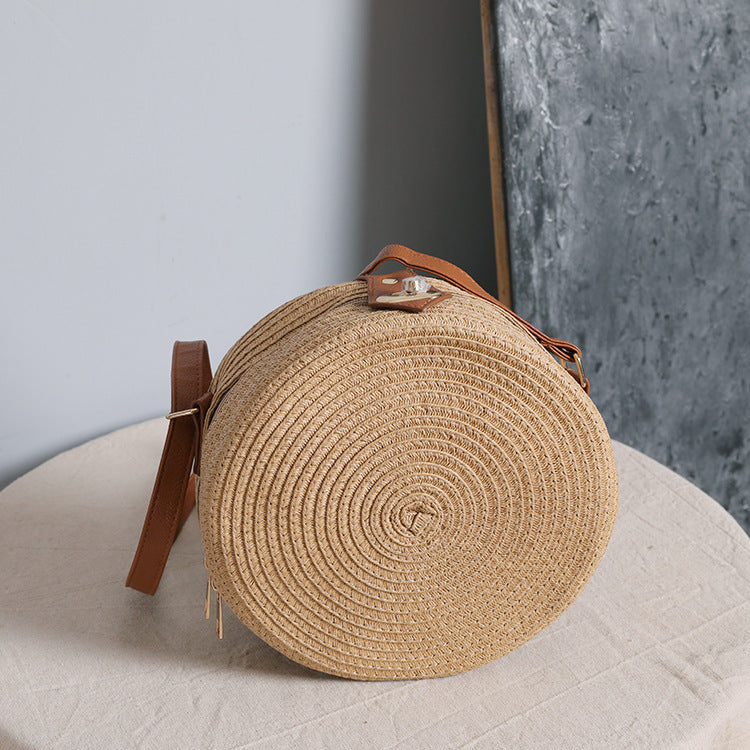 Round shoulder bag made of natural material with stylish accents LoungeYard — product view 2