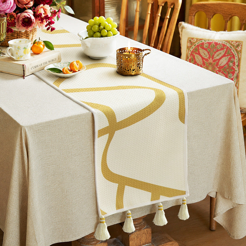 Light waffle texture throw blanket with geometric print and tassels — product view 2