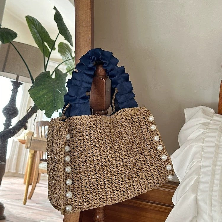 Fashionable straw bag with ruffle detail LoungeYard — product view 1