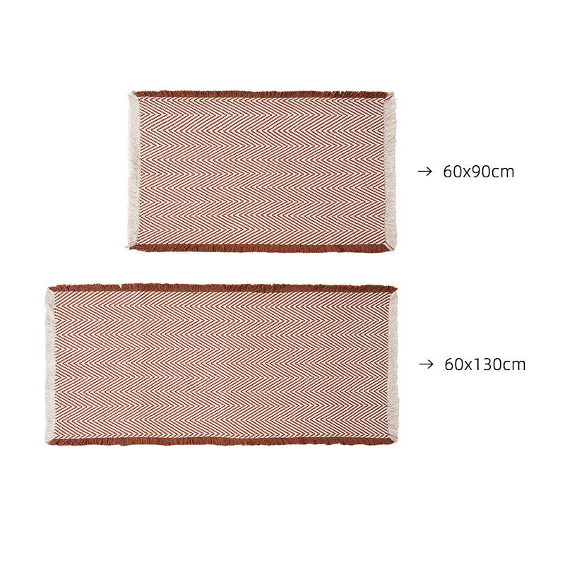 Handwoven cotton bath mat with herringbone pattern and fringes LoungeYard — product view 5