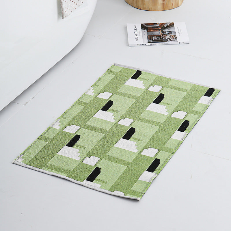 Modern geometric bathroom rug made of flat-woven cotton with non-slip backing LoungeYard — product view 2
