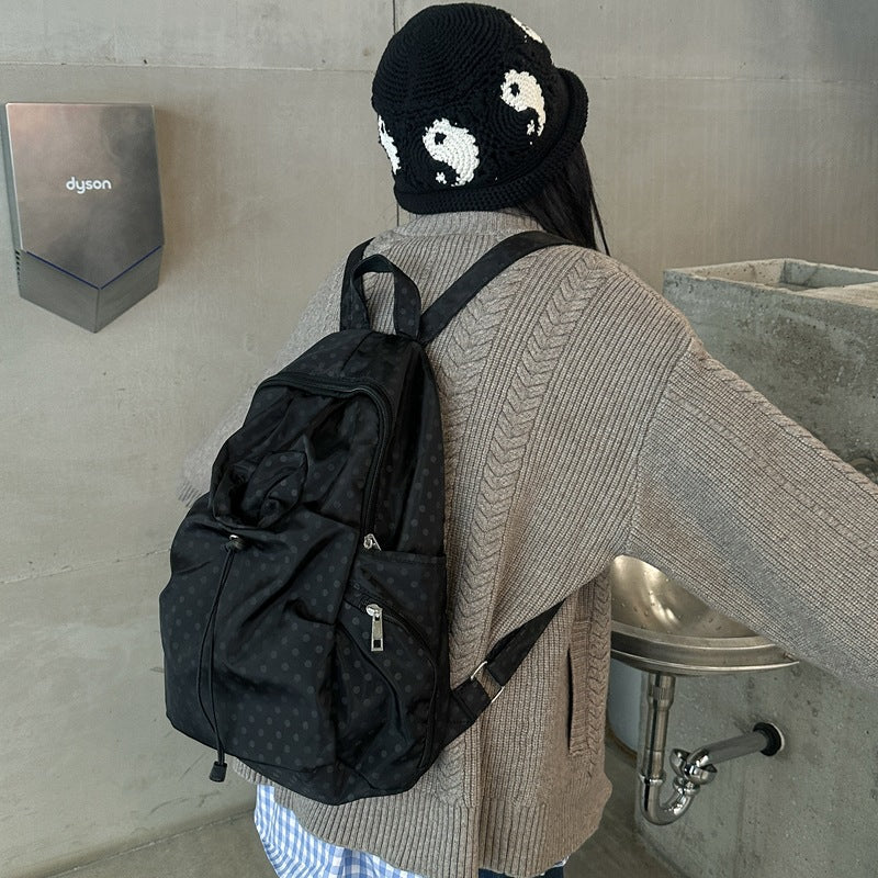 Leisure backpack with functional folding technique and multiple outer pockets LoungeYard — product view 2