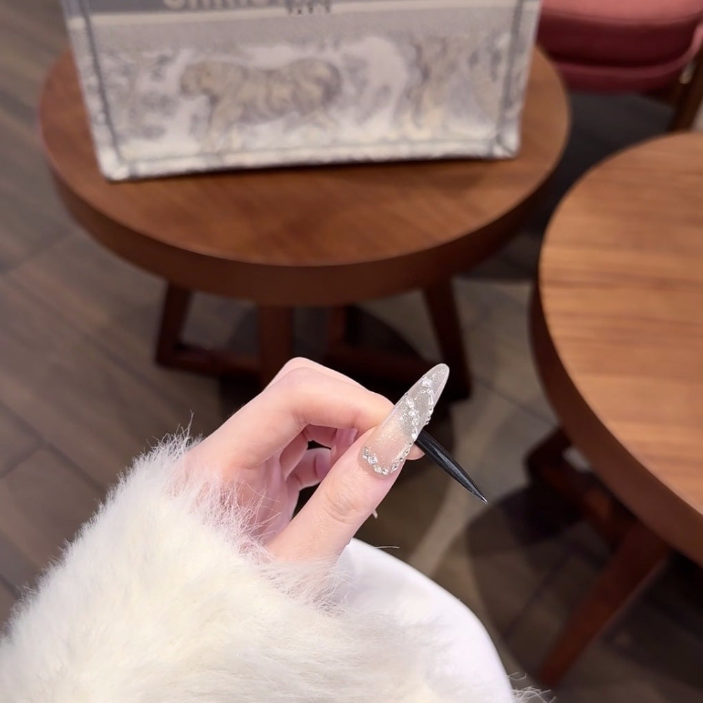 Artistic Long Stiletto Nail Extensions with Crystal Accents — product view 1