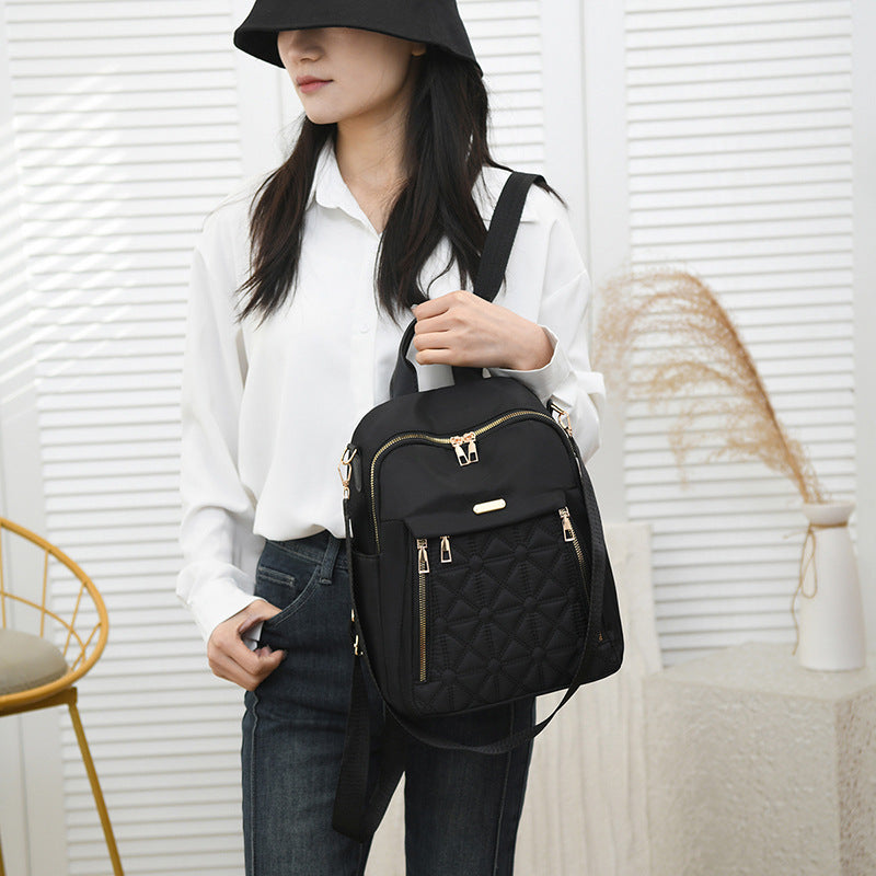 Elegant backpack bag with structured design and practical compartments LoungeYard — product view 3