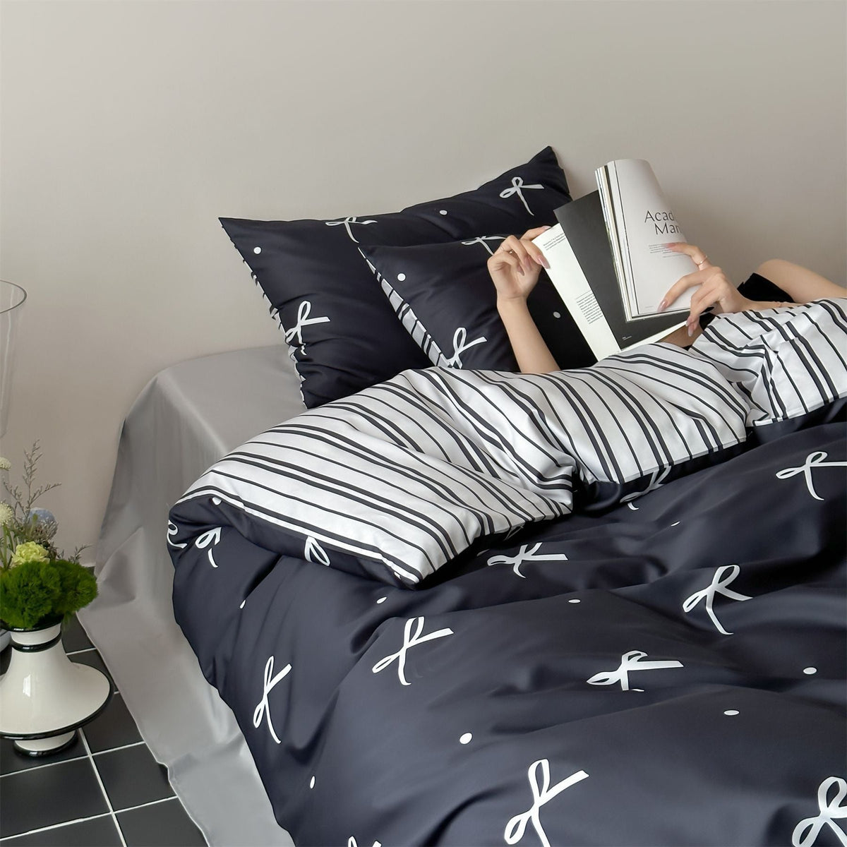 Modern cotton bedding set with minimal bow print and striped reversible side — product view 2