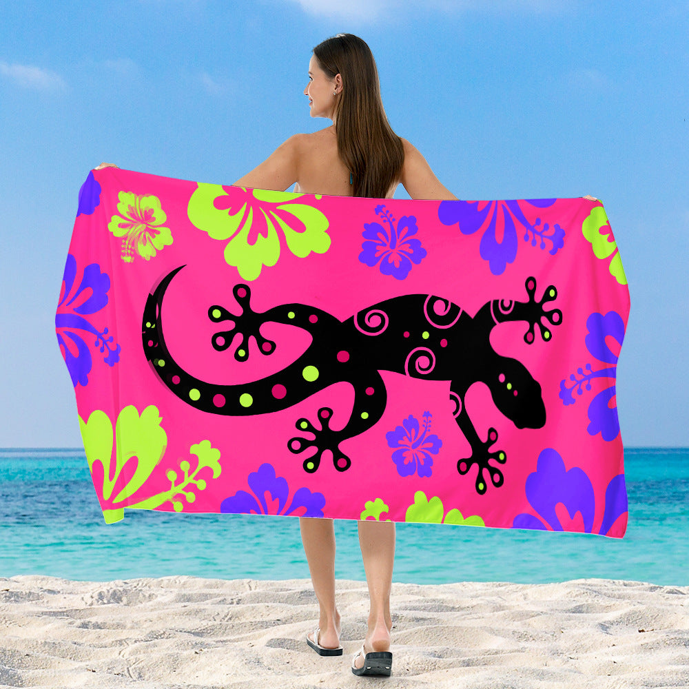 Beach towel with vibrant, colorful animal motif LoungeYard — product view 4