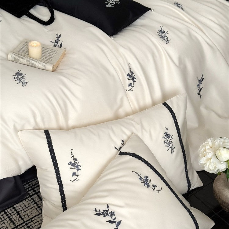 Luxurious satin bed linen set with fine floral embroidery LoungeYard — product view 4