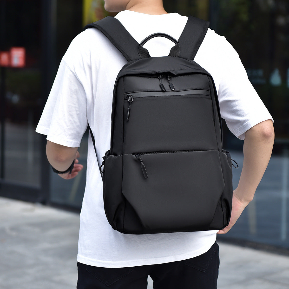 Practical city backpack with multiple compartments and waterproof material LoungeYard — product view 1