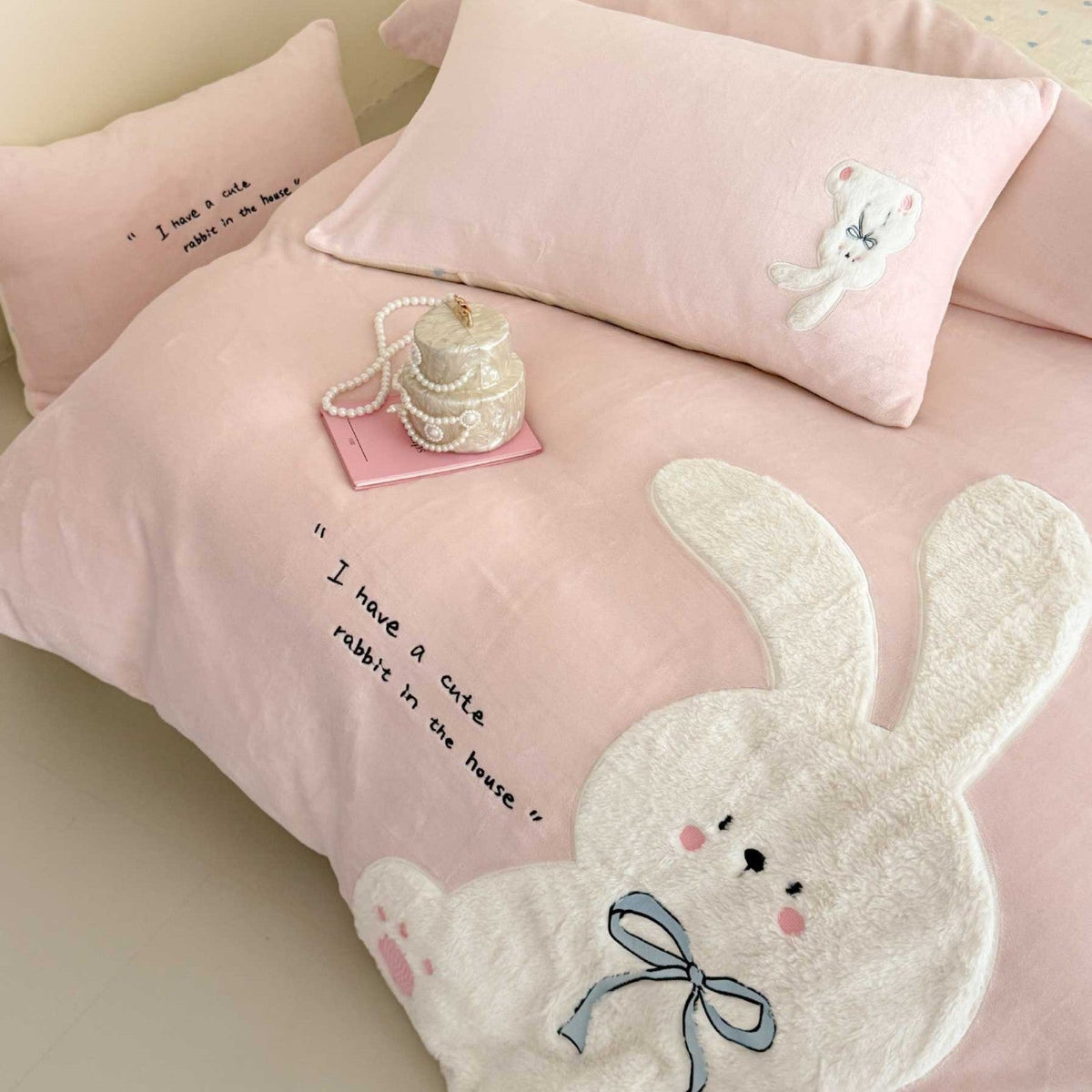 Cozy bedding set with embroidered rabbit appliqué and reversible cover — product view 1