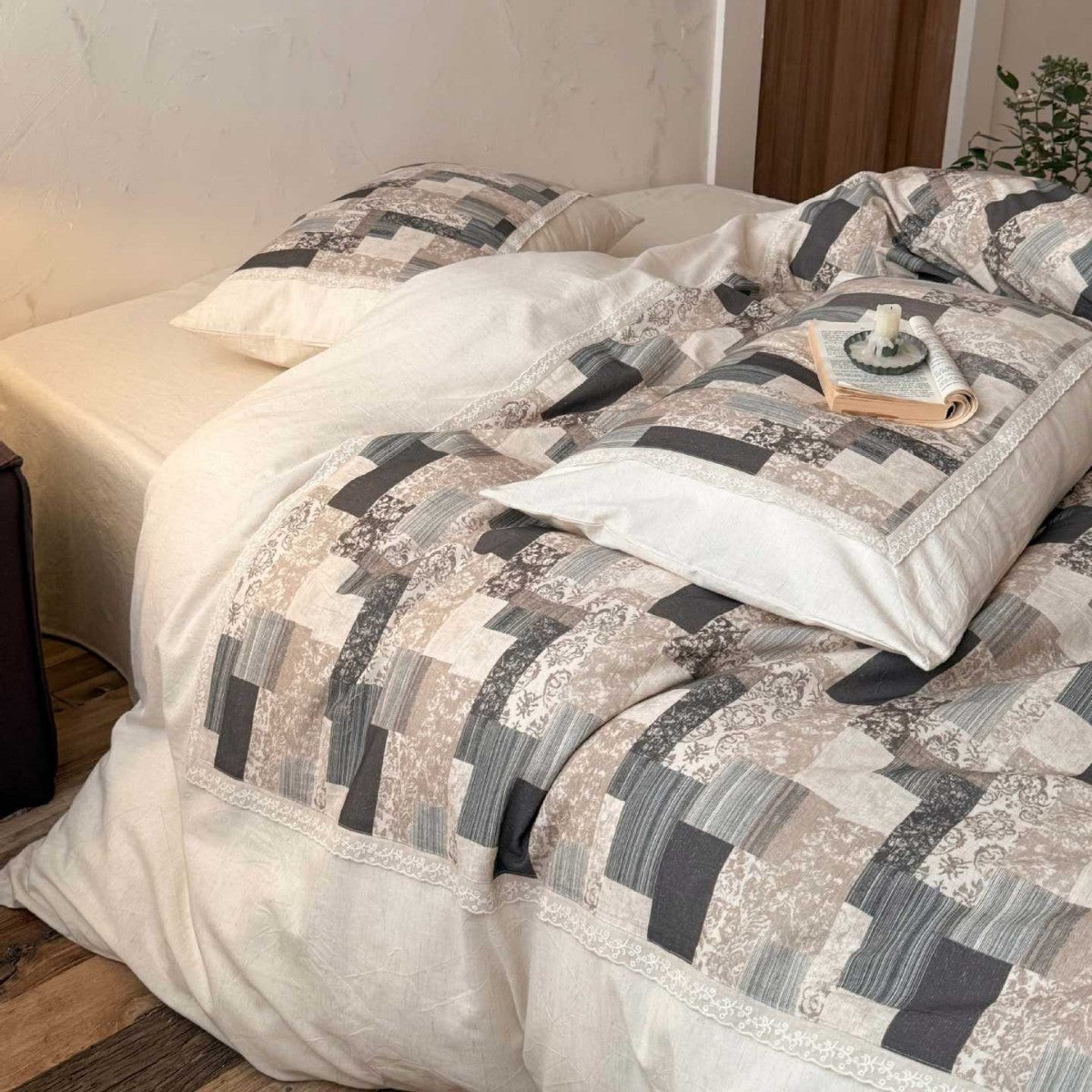Modern patchwork bedding set in linen look with reversible design — product view 1