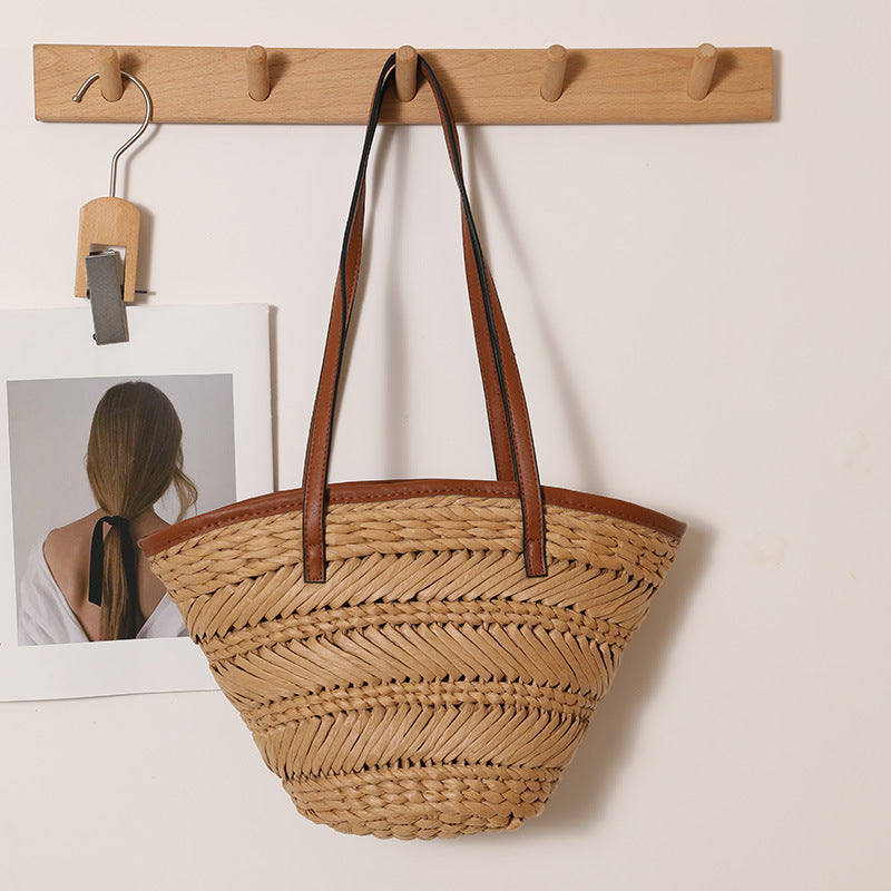 Braided basket bag with innovative leather handles LoungeYard — product view 1