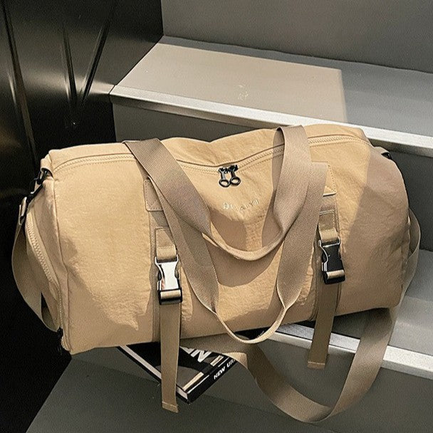 Sporty Duffel Bag with Adjustable Shoulder Strap and Ergonomic Handles LoungeYard — product view 1