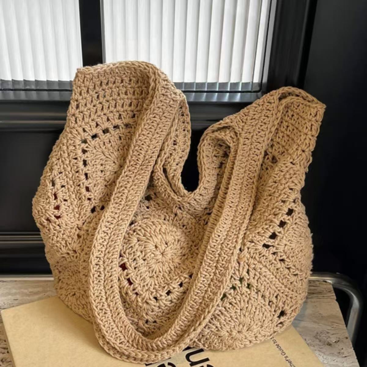 Handbag made of braided natural material with tassel details LoungeYard — product view 5