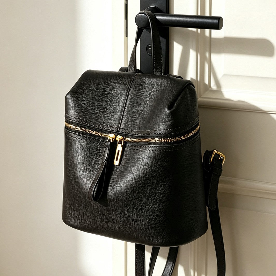 Small Structured Pebbled Leather Mini Backpack with Front Zip Pocket and Top Handle — product view 1