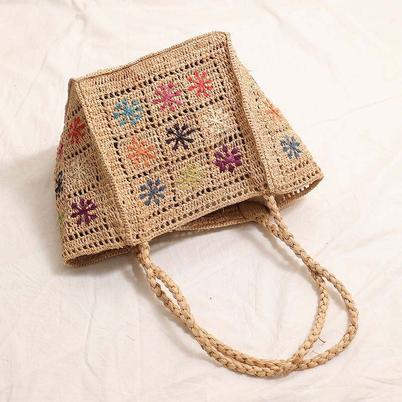 Handcrafted straw bag with colorful embroidery design LoungeYard — product view 4