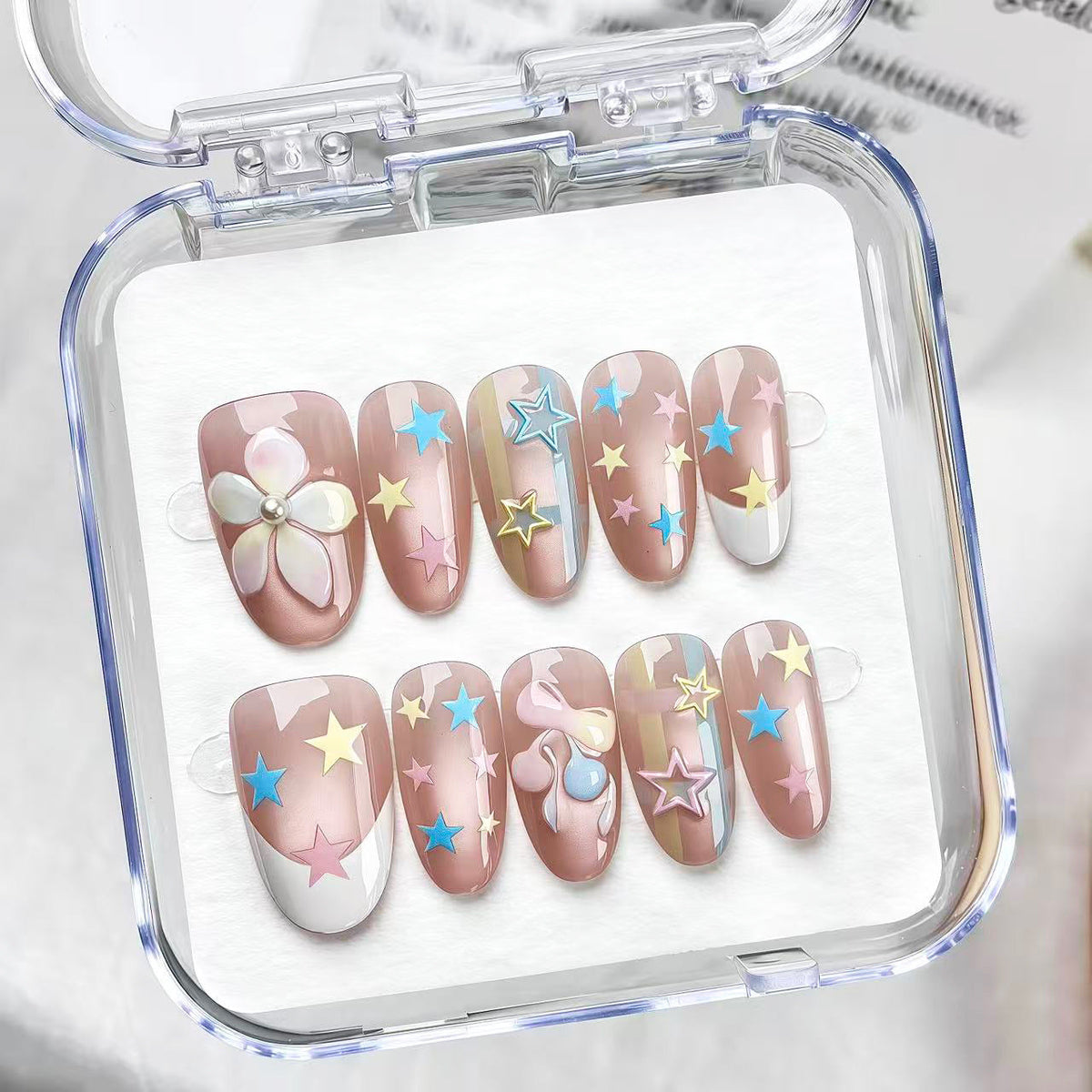 Artistic Press-On Nail Set with Star and Flower Designs — product view 3