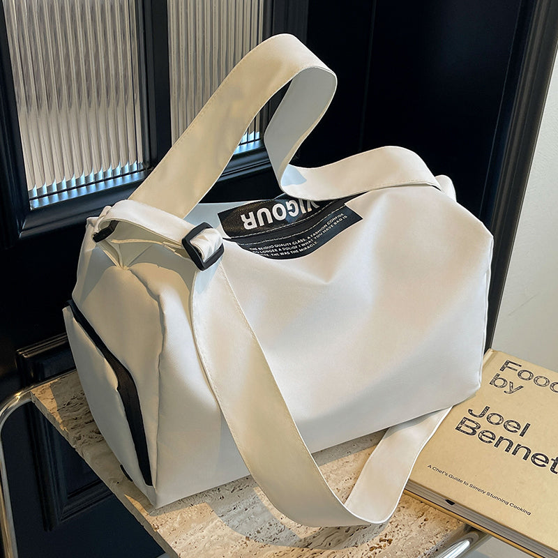 Stylish travel bag with versatile carrying options LoungeYard — product view 1