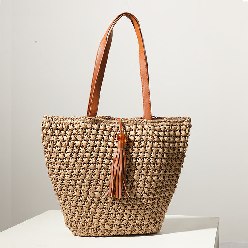 Handcrafted basket bag with fashionable tassel detail LoungeYard — product view 3