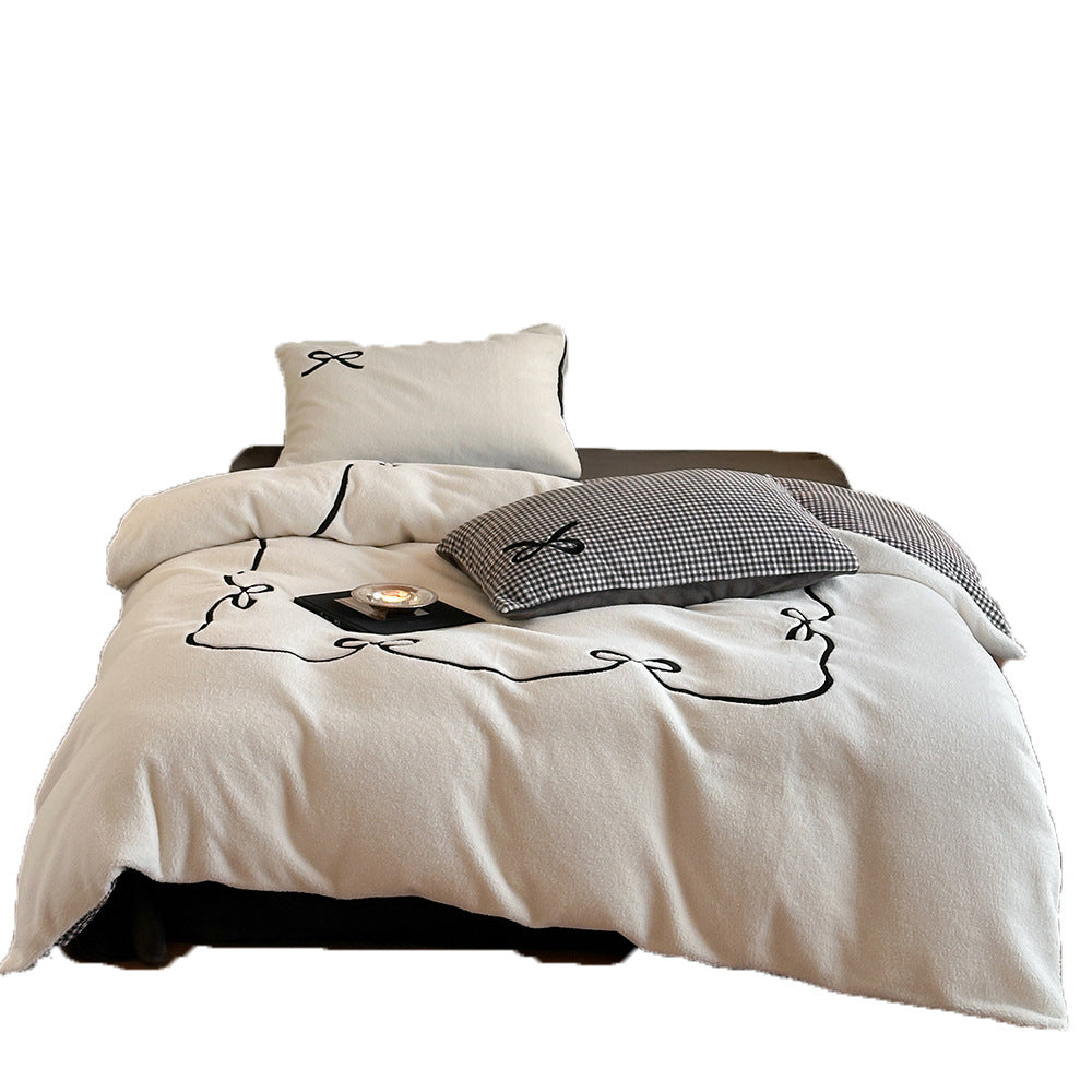 Reversible microfiber bedding set with plush surface, pom-pom corners, and paw embroidery — product view 5