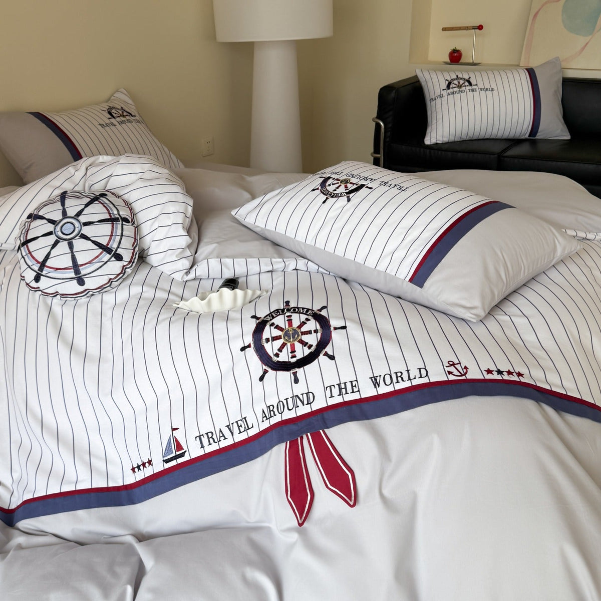 Maritime bedding set made of cotton satin with embroidered steering wheel and fine pinstripes — product view 1