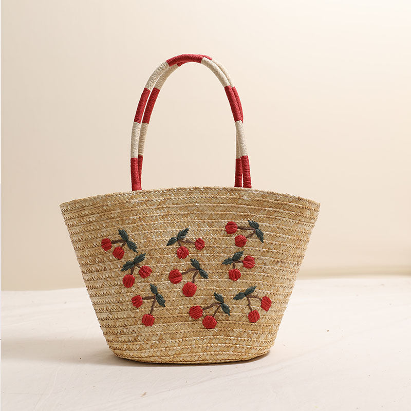 Handcrafted basket bag with vibrant floral embroidery design LoungeYard — product view 6