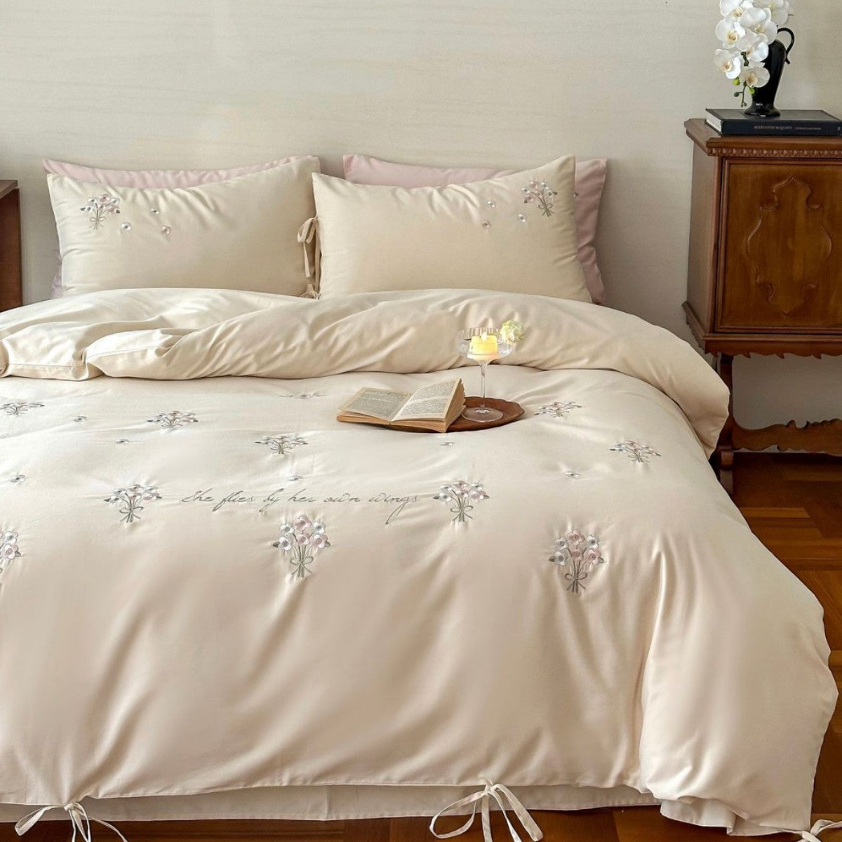 Luxurious satin bedding set with delicate pearl flower embroidery and tie ribbons — product view 2