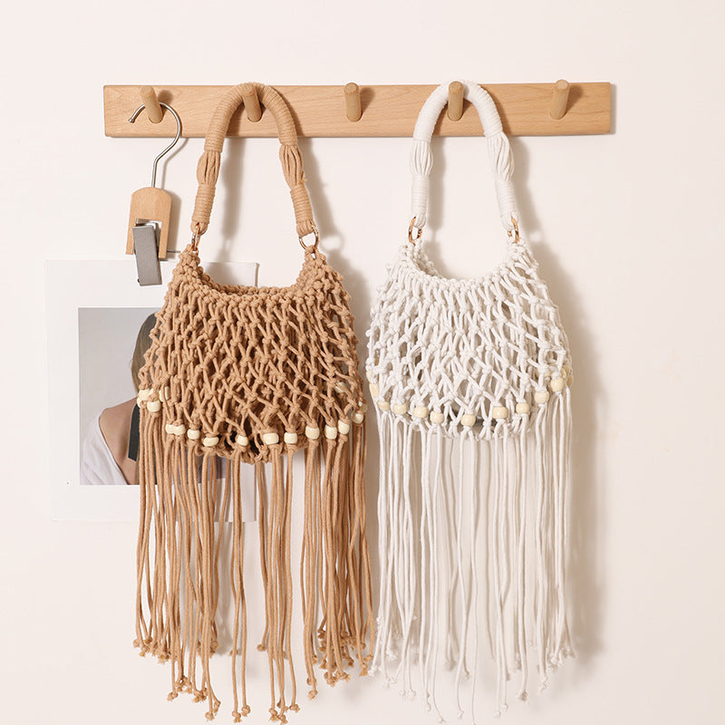 Macrame bag with decorative fringes and wooden beads LoungeYard — product view 1