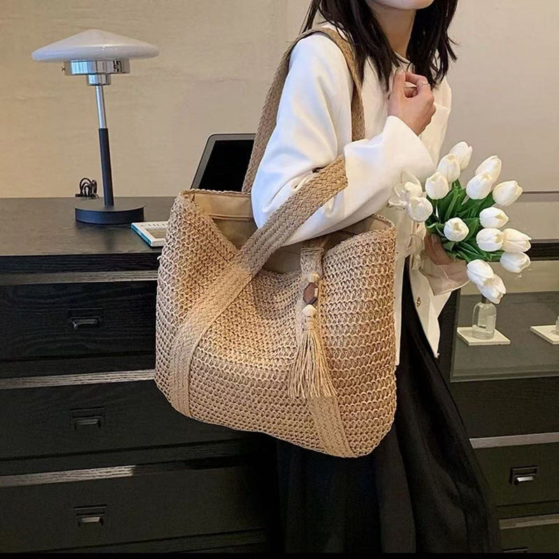 Handbag Made of Natural Weave with Decorative Tassel Detail LoungeYard — product view 1