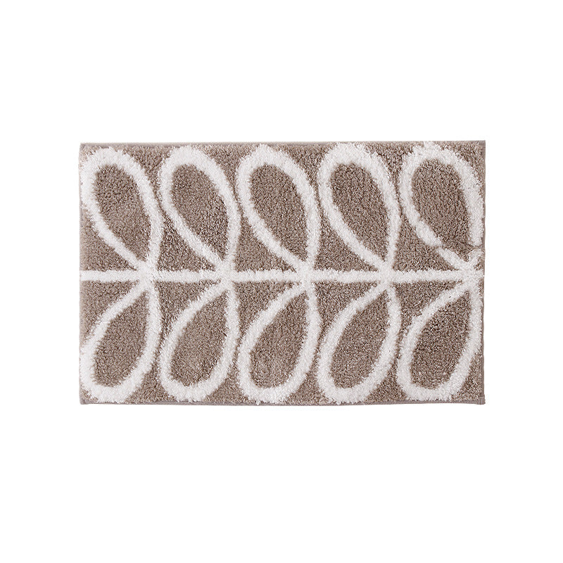 Fluffy bath mat in a graphic wave relief with anti-slip base LoungeYard — product view 7