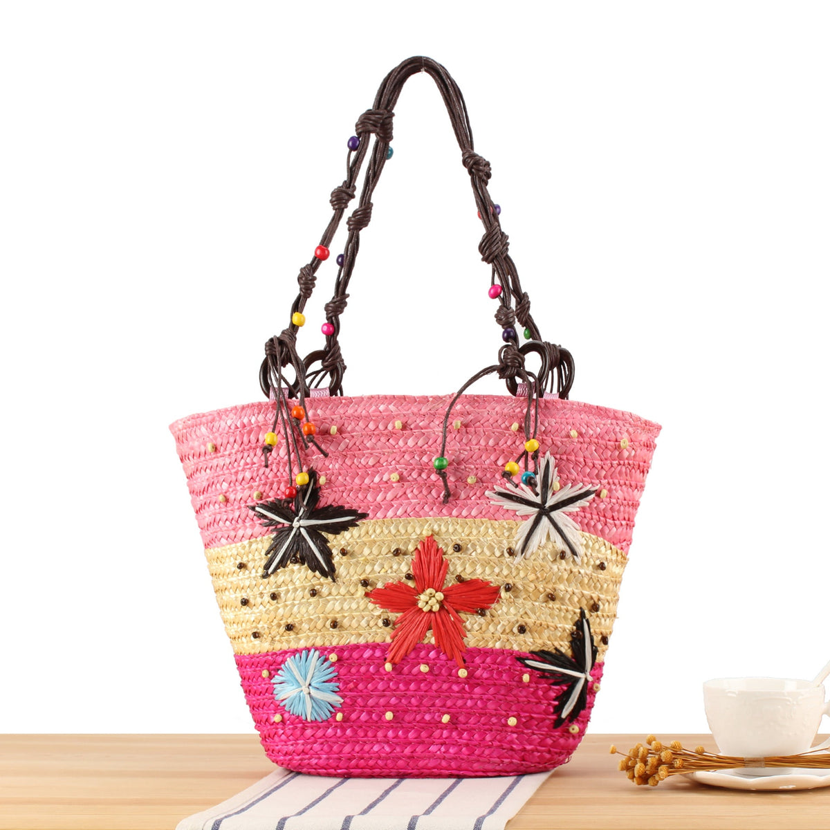 Handcrafted beach bag with cheerful floral patterns LoungeYard — product view 1