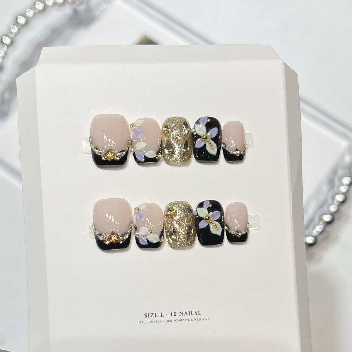 Decorative Press-On Nail Art Set with Floral and Glam Accents — product view 3