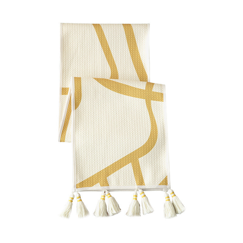Light waffle texture throw blanket with geometric print and tassels — product view 5