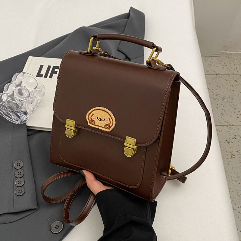 Playful Cartoon-Embroidered Satchel Bag LoungeYard — product view 1