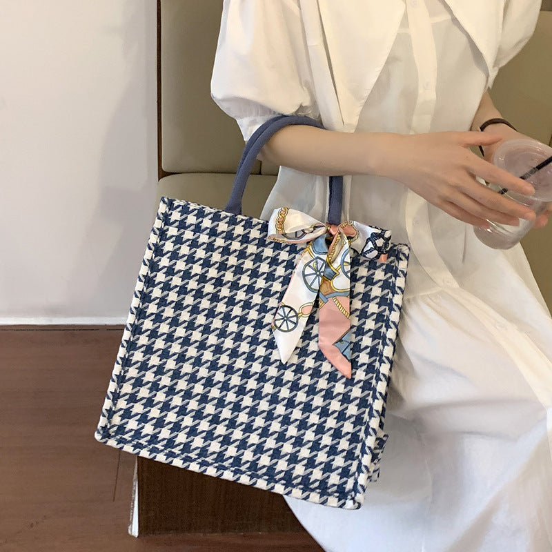 Elegant Houndstooth Handbag with Decorative Bow — product view 1