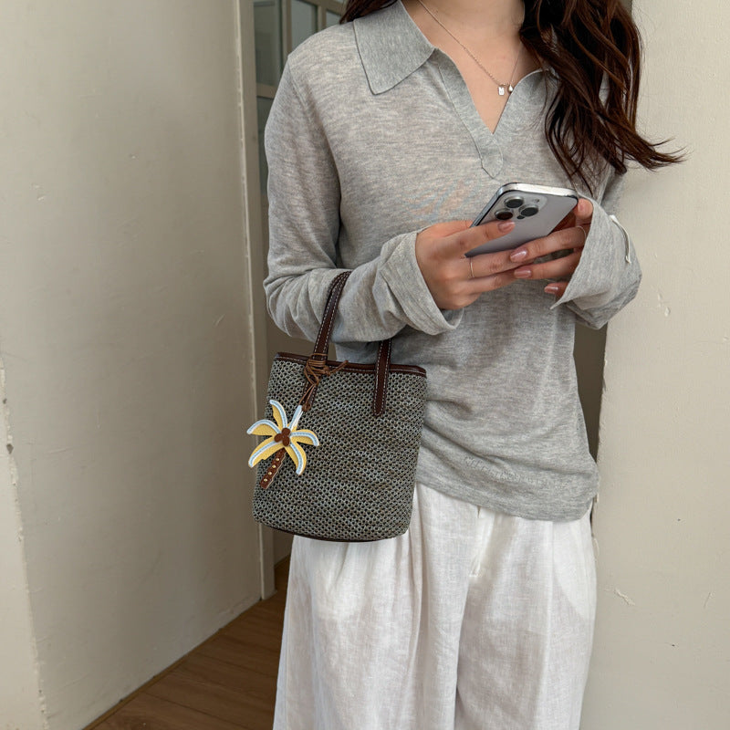 Woven Beach Handbag with Decorative Charm — product view 3