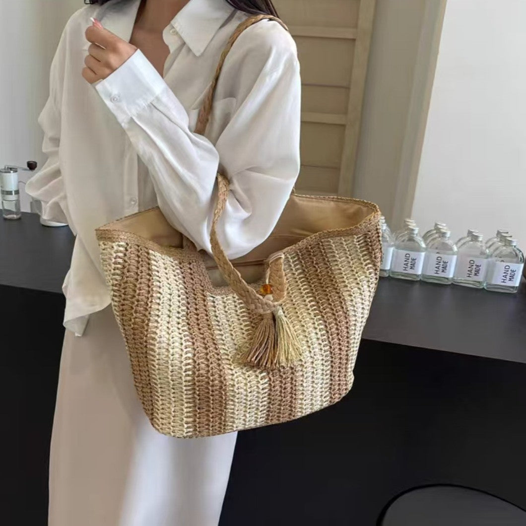 Beach bag with cheerful stripes and tassel details LoungeYard — product view 2