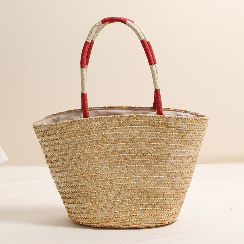 Handcrafted basket bag with vibrant floral embroidery design LoungeYard — product view 3