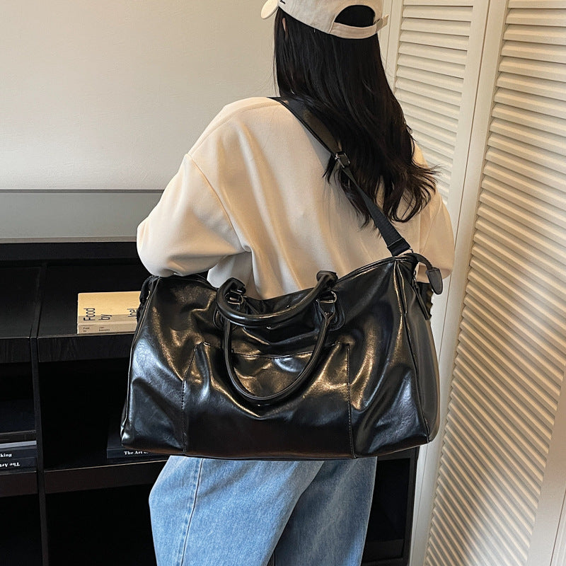 Practical everyday duffel bag with sturdy handles LoungeYard — product view 1