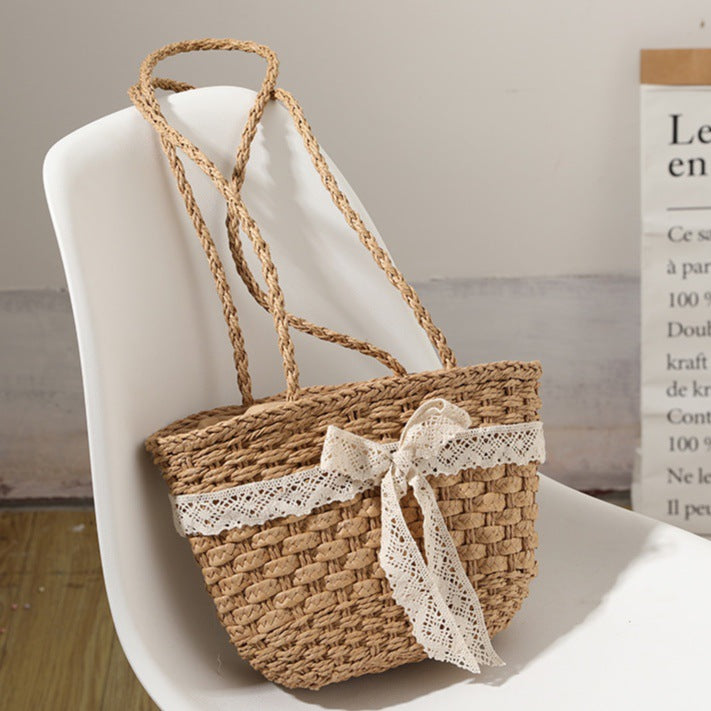 Elegant basket bag with decorative lace ribbon LoungeYard — product view 1