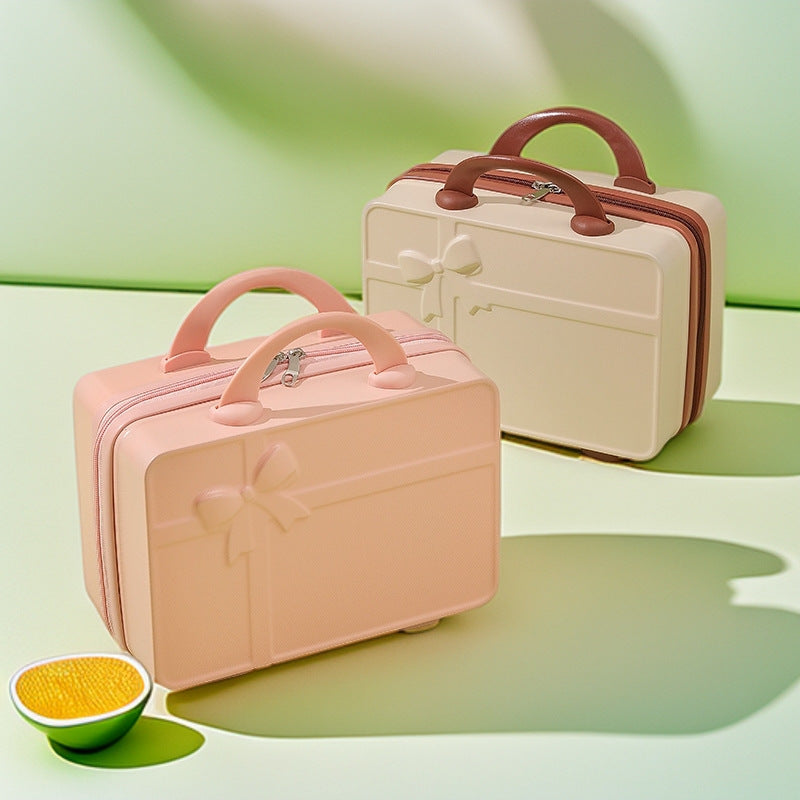 structured hard-shell cosmetic travel case with embossed bow and dual top handles LoungeYard — product view 2