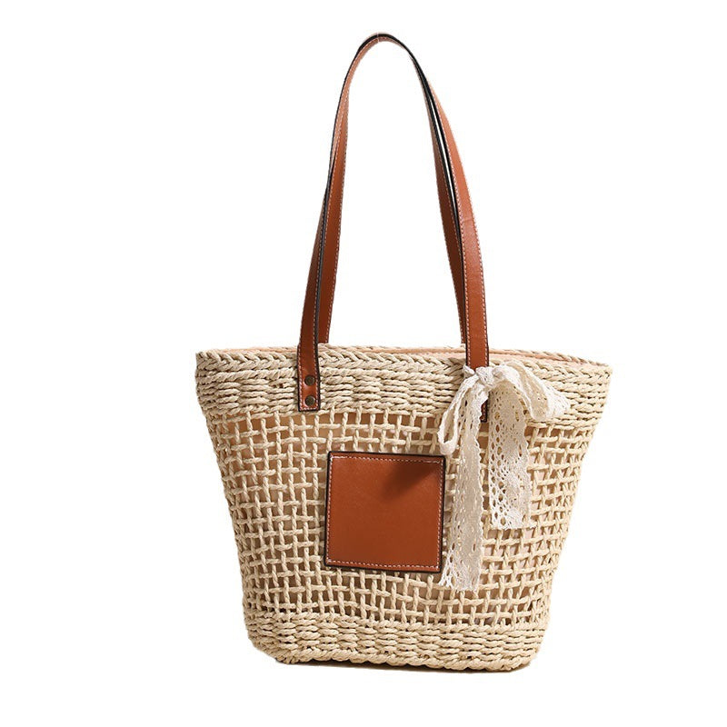 Handmade straw bag with elegant leather accents LoungeYard — product view 5