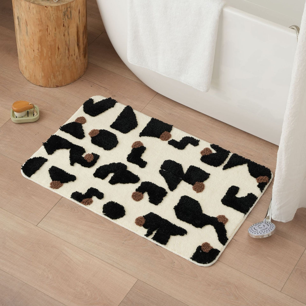 Tufted bathroom mat in abstract leopard pattern with soft high pile LoungeYard — product view 3