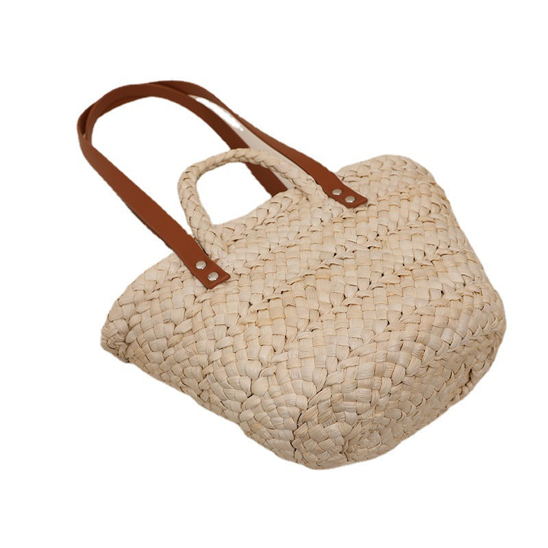 Handcrafted straw bag with sturdy leather handles LoungeYard — product view 5