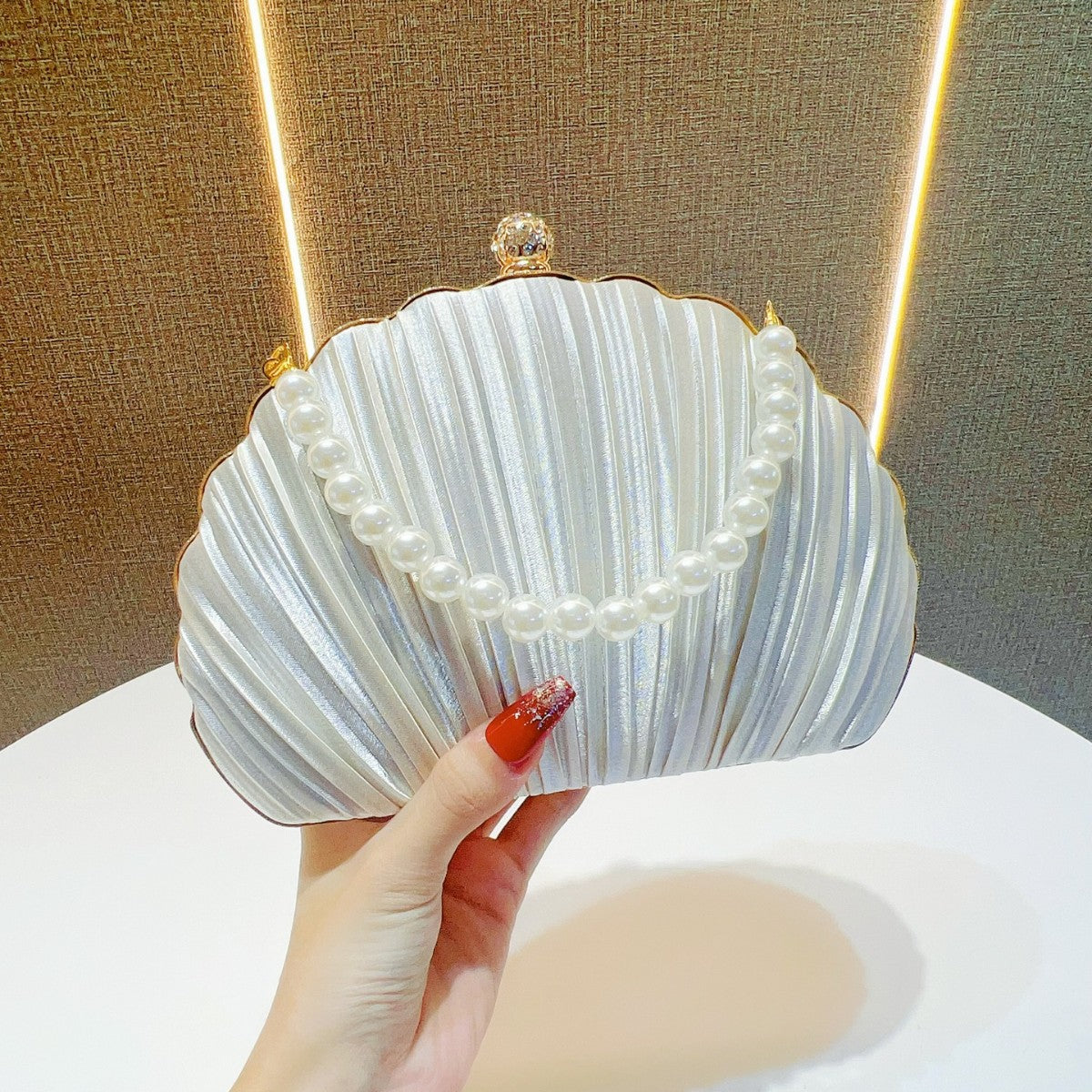 Pearl-Accented Pleated Evening Clutch — product view 1